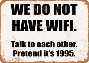Sign saying: "We do not have wifi. Talk to each other. Pretend it's 1995."